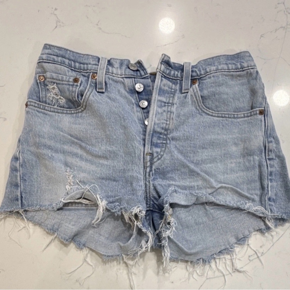 Levi's women’s Light Blue cutoff Denim Shorts Button Accent size 26